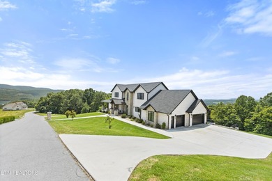 Exquisite Custom Estate in Rock Harbor with Panoramic Lake Views - photo 4