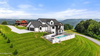 Exquisite Custom Estate in Rock Harbor with Panoramic Lake Views - photo 9