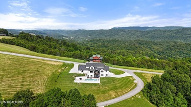 Exquisite Custom Estate in Rock Harbor with Panoramic Lake Views - photo 10