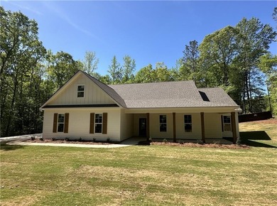 If you're looking for a brand new, one-level home on a large lot - photo 1