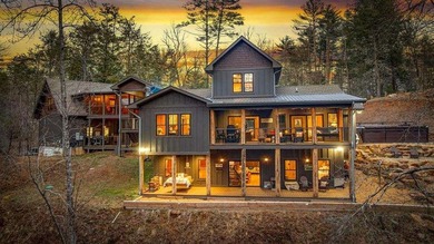 Set on 8.5 pristine acres, this extraordinary custom-built cabin