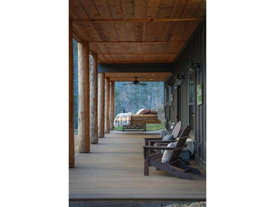 Set on 8.5 pristine acres, this extraordinary custom-built cabin