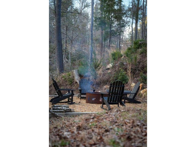 Set on 8.5 pristine acres, this extraordinary custom-built cabin