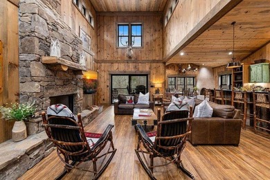 Set on 8.5 pristine acres, this extraordinary custom-built cabin