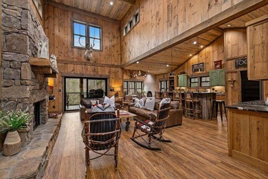 Set on 8.5 pristine acres, this extraordinary custom-built cabin - photo 25
