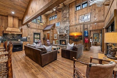Set on 8.5 pristine acres, this extraordinary custom-built cabin - photo 27