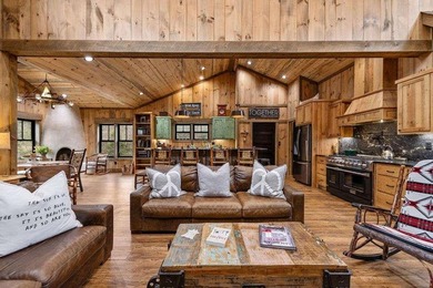Set on 8.5 pristine acres, this extraordinary custom-built cabin - photo 29