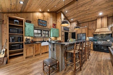Set on 8.5 pristine acres, this extraordinary custom-built cabin - photo 30