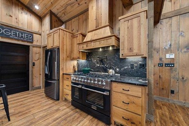 Set on 8.5 pristine acres, this extraordinary custom-built cabin - photo 31