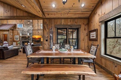 Set on 8.5 pristine acres, this extraordinary custom-built cabin - photo 38