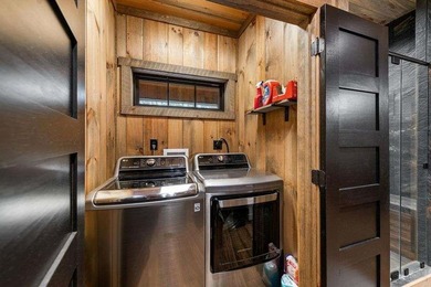 Set on 8.5 pristine acres, this extraordinary custom-built cabin - photo 42