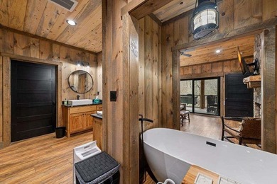 Set on 8.5 pristine acres, this extraordinary custom-built cabin - photo 43