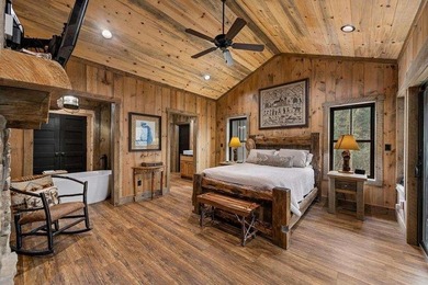 Set on 8.5 pristine acres, this extraordinary custom-built cabin - photo 45