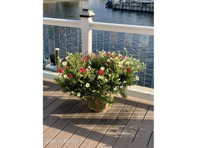 Welcome to this beautifully redone raised ranch in the