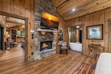 Set on 8.5 pristine acres, this extraordinary custom-built cabin - photo 47