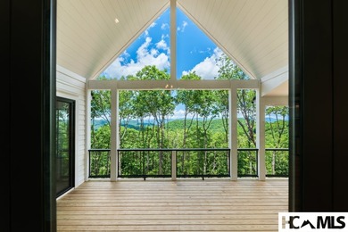 Perched within the gated enclave of Chinquapin, this stunning - photo 3