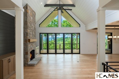 Perched within the gated enclave of Chinquapin, this stunning - photo 4