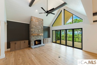Perched within the gated enclave of Chinquapin, this stunning - photo 6