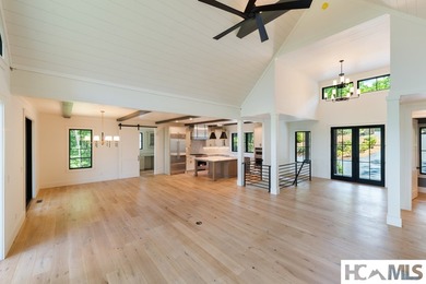 Perched within the gated enclave of Chinquapin, this stunning - photo 8