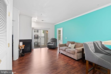 Welcome home to this well-located 2-bedroom, 2-bath condo in the - photo 3