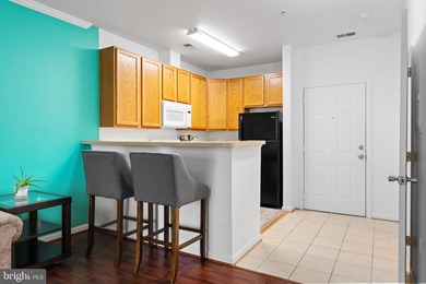 Welcome home to this well-located 2-bedroom, 2-bath condo in the - photo 6