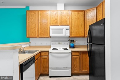 Welcome home to this well-located 2-bedroom, 2-bath condo in the - photo 8