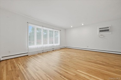 Beautifully maintained high-ranch home featuring 4 bedrooms and - photo 2