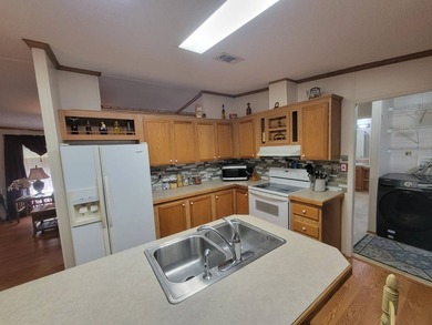 Your Dream Home Awaits in a 55+ Gated Community! This rare - photo 22