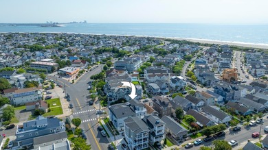 Welcome to this stunning Dean Adams-built beach block 5-bedroom