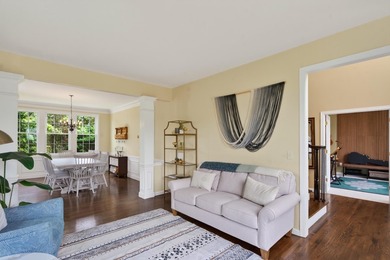 Nestled in the sought-after Pine Hollow neighborhood in the - photo 3