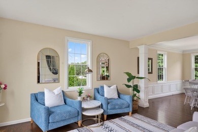 Nestled in the sought-after Pine Hollow neighborhood in the - photo 4