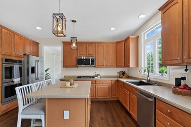Nestled in the sought-after Pine Hollow neighborhood in the - photo 7