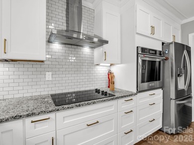 This newly renovated brick ranch home is hidden and secluded - photo 11