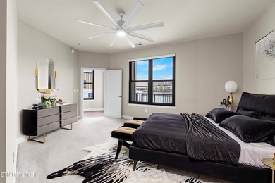 This luxurious waterfront condo overlooks the Tennessee River
