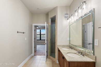 This luxurious waterfront condo overlooks the Tennessee River