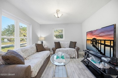 This beautifully renovated 3-bedroom concrete block home tucked - photo 18