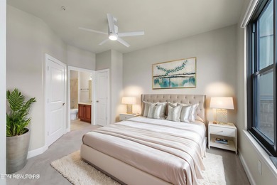 This luxurious waterfront condo overlooks the Tennessee River