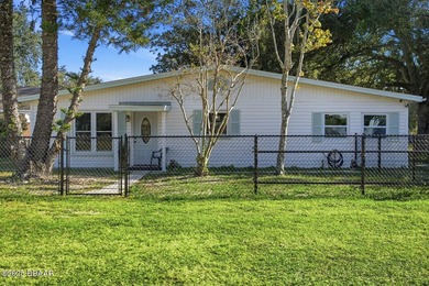 This beautifully renovated 3-bedroom concrete block home tucked - photo 21