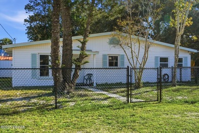 This beautifully renovated 3-bedroom concrete block home tucked - photo 22