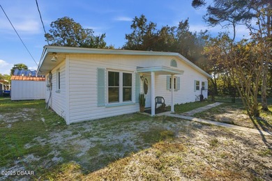 This beautifully renovated 3-bedroom concrete block home tucked - photo 23