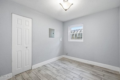 This beautifully renovated 3-bedroom concrete block home tucked - photo 29