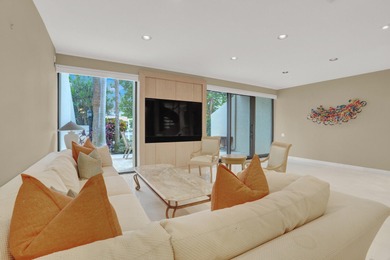 Set within Yacht & Racquet Club of Boca Raton, one of the area's