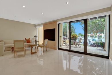 Set within Yacht & Racquet Club of Boca Raton, one of the area's