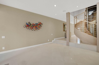 Set within Yacht & Racquet Club of Boca Raton, one of the area's