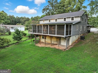 Fully remodeled and move-in ready, this impressive 5-bedroom, 3 - photo 3