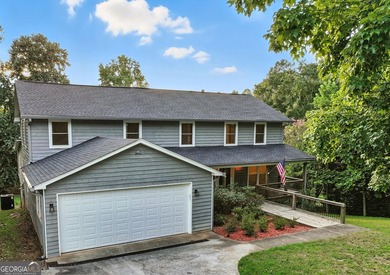 Fully remodeled and move-in ready, this impressive 5-bedroom, 3 - photo 7