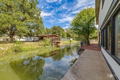 Stunning Lake Nasworthy home nestled along two canals with main - photo 56