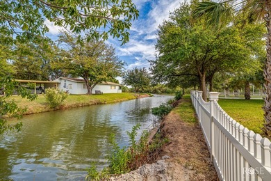Stunning Lake Nasworthy home nestled along two canals with main - photo 57