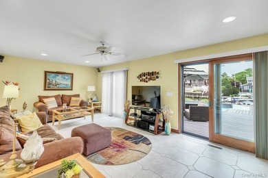 WATERFRONT LIVING AT ITS FINEST Nestled within a private - photo 7