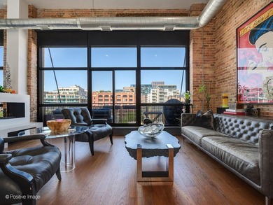SOARING CEILINGS. EXPOSED BRICK. TRUE WEST LOOP PENTHOUSE LIVING - photo 2